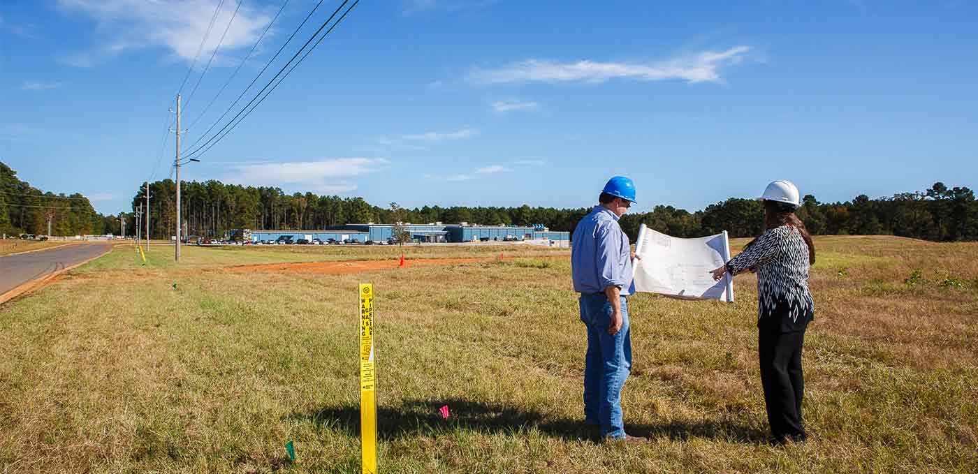 engineers on site surveying